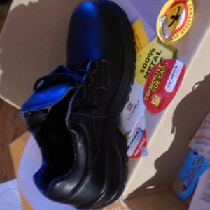 New never worn safety shoe.